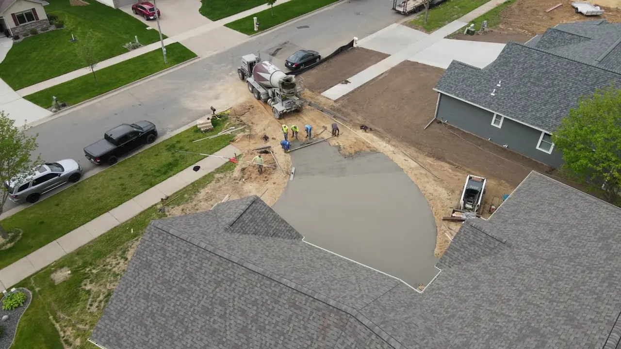 A new concrete driveway in Lake Alfred with a broom finish and straight joints